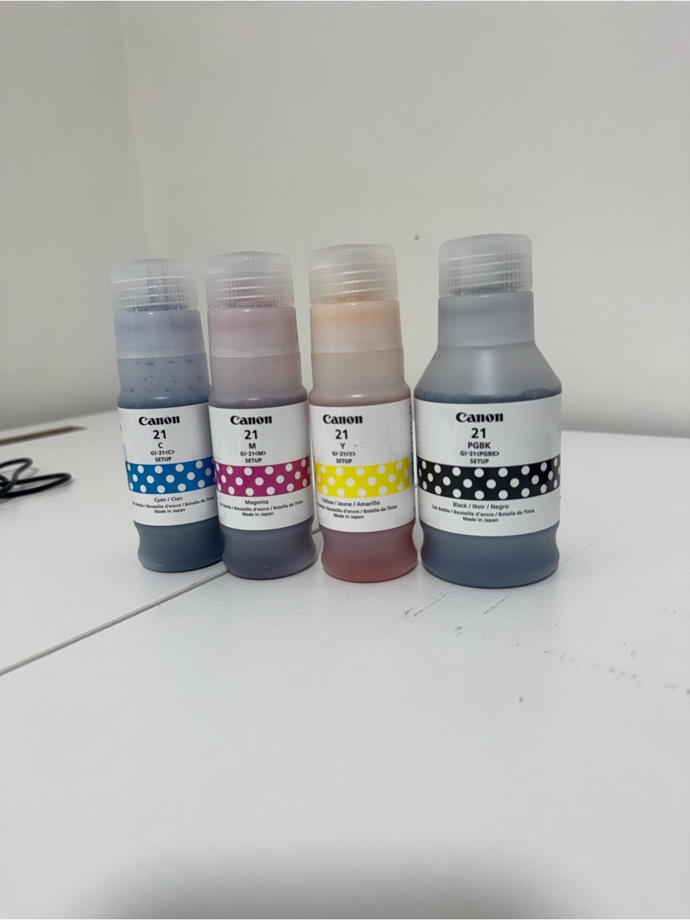 Genuine Canon 21 colour ink black, magnets, cyan, yellow.